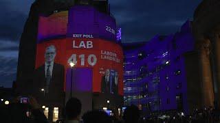 Exit polls projected onto BBC HQ show Labour landslide in UK election | AFP