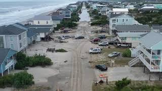 8-4-2020 Oak Island, NC Hurricane Isaias drone aftermath at first light shows city covered in sand