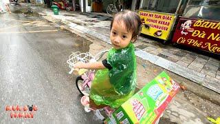Super cute! Diem braved the rain to go to the supermarket to buy milk