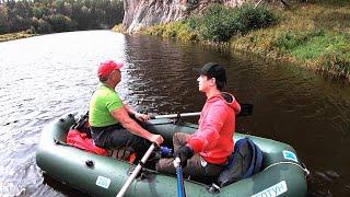 River rafting. Beautiful rocks and autumn forest.