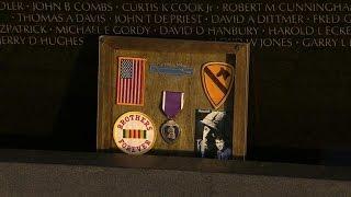 Mementos left at Vietnam Veterans Memorial reveal personal stories