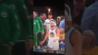 Watch what happens to the fan after Klay Thompson makes a three pointer