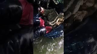 Wet clothes boots lie on an inflatable circle. wetlok. river. wet. #wet #river #boots  #shorts