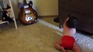 We have a crawler! She found her inspiration in Daddy's vintage guitar;)