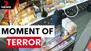 CCTV shows moment gunmen open fire in Auburn kebab shop, shooting three people | 7NEWS