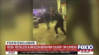 Shocking video shows young men dancing with guns in west Mobile gas station parking lot