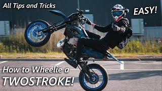 How to Wheelie a TWOSTROKE! | 300cc Twostroke Supermoto