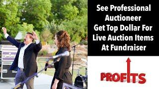 Professional Auctioneer Gets Top Dollar For Live Auction Items At Fundraiser