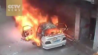 Two boys throw firecrackers into a car, burn it down