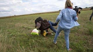 UNGARN - Aufnahmen zeigen Tritte der Kamerafrau gegen Flüchtlinge