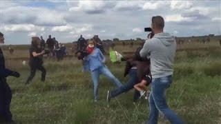 Hungarian Camerawoman Trips Refugee