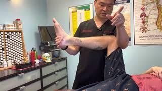 BLACK BELT Chiropactor using Applied Kinesiology Technique on ￼ Waco patient. By Dr John Huang.