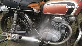 Rusty Motorcycle water blasting