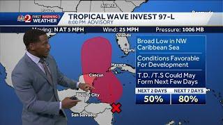 Invest 97-L continues to strengthen over the Caribbean Sea, headed toward Gulf of Mexico, NHC says