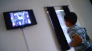 Crazy kid playing wii