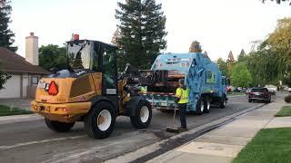 Sacramento rear loader and tractor collecting bulk waste (Part 1/2)