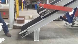 Bag Flattener Conveyor for Palletizing Bags of Fertilizer