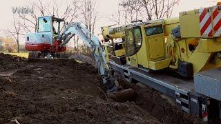 VN24 - Mobile crane stuck in the mud - preparatory excavator work for the recovery