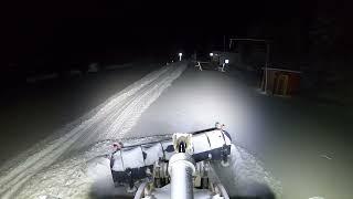 cleaning up after a Swedish snowstorm  Caterpillar 972M XE Wheel Loader plow snow with diagonal plow