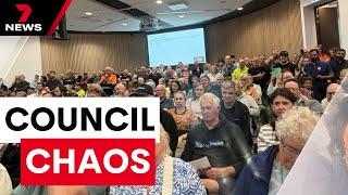 Council meeting shut down and police called in as residents vent their fury | 7NEWS