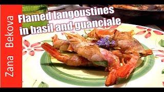 Flamed langoustines (shrimps) wrapped in guanciale and basil