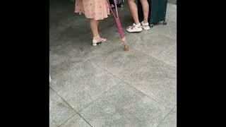 One Legged Asian Amputee Woman- One Legged Amputee Girl Walking With Crutches In The Public Place