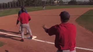 Can a 3rd base coach assist a runner