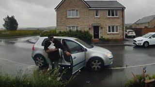 Boy stops delivery driver's car from rolling away on a rainy day || WooGlobe