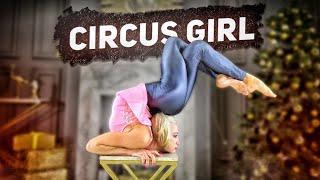 Contortion Solo. Circus girl Alesya doing flexible poses. Flexshow studio. Gymnast and acrobat.