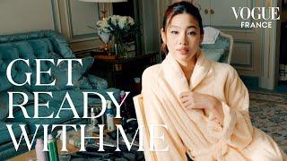 Hoyeon gets ready for the Louis Vuitton show during Paris Fashion Week | Vogue France