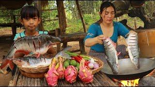 Cooking fish crispy for tasty delicious- Mother cooking fish with red pepper for dinner