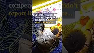 Men toppling claw machine ends up shattering glass #shorts