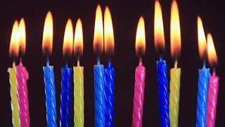 Colorful Birthday Candles Burning Stock Video