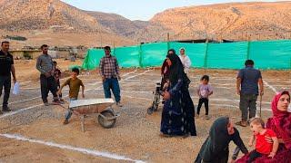 Village Construction: Peren Family Receives the Building Plan from the Engineer