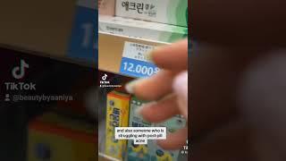 buying skincare in Korean pharmacy as acne prone skin girl