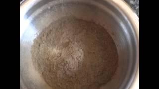 Mixing Bhringraj Ayurvedic Powder for Hair