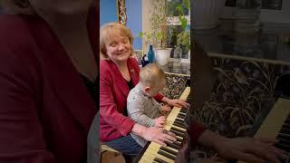 Grandma does not play piano, but Gavriil does in his 1.5 y.o.