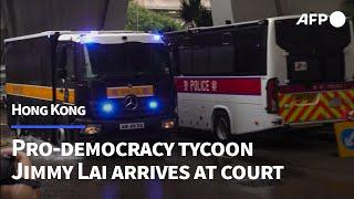 Vehicle carrying HK tycoon Jimmy Lai arrives at court | AFP