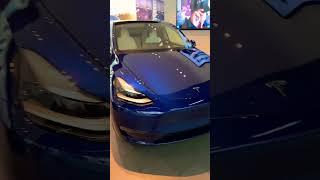 Tesla Model Y Deep Blue Metallic with White Interior