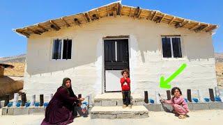 A widowed mother builds a home for her children in the heart of the wild mountains