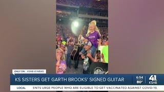 KC sisters get Garth Brooks' guitar