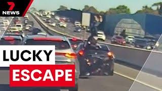 Motorbike rider dicing with death on a Melbourne freeway | 7NEWS