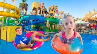 Nastya and daddy's gift day at the water park