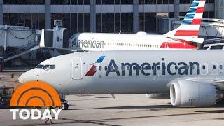 Passengers duct tape man attempting to open plane door mid-flight