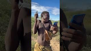 Hadzabe Tribe bushmen brush his hair for the first time ever 