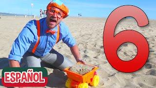 Blippi en la playa con juguetes de arena | Aprende colores para niños