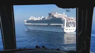 Il-38N flies near the US cruise ship Sapphire Princess