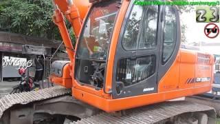 Excavator Doosan DX225LCA And Compactor