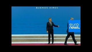 Watch: Argentine president left standing awkwardly after Trump wanders off