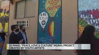 UNM youth art group unveils mural at local nonprofit